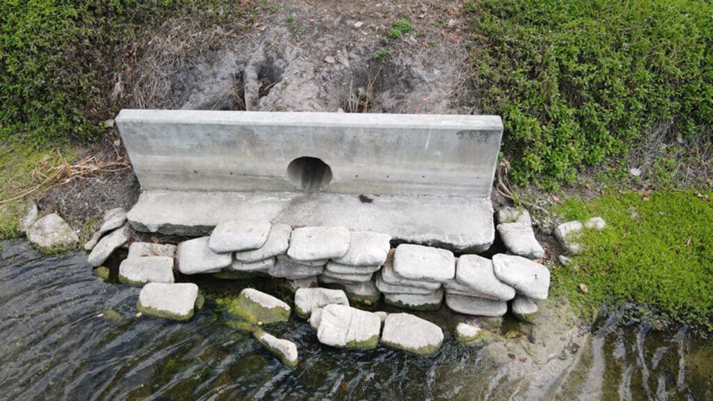 stormwater outfall into a retention pond
