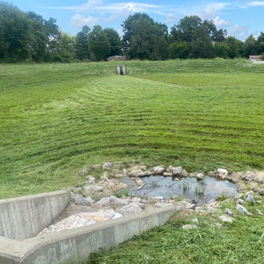 grassed swale and a rip rap