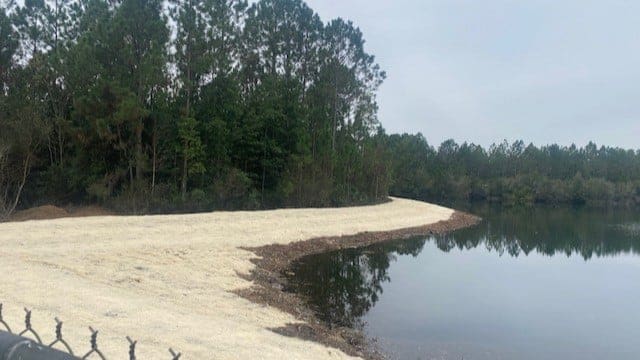 after picture of a retention pond shoreline project by AQUALIS