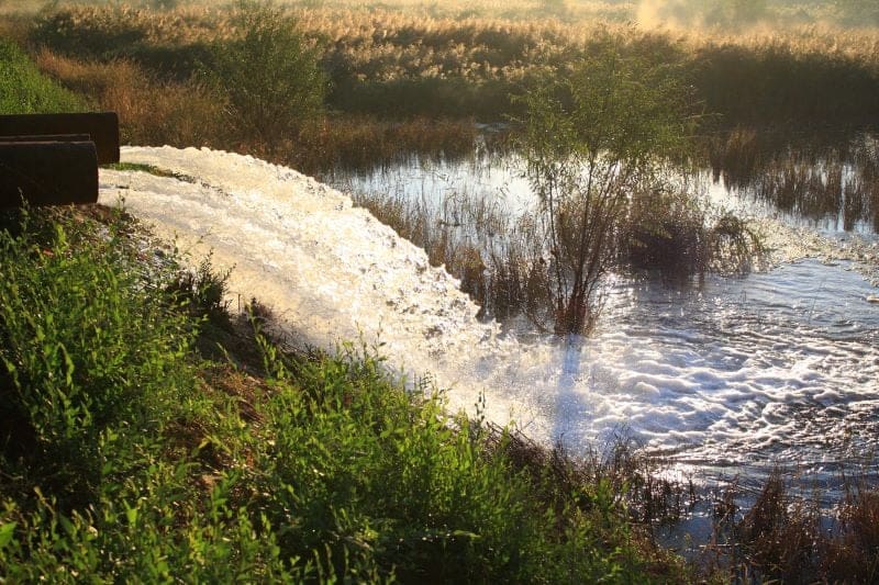 Water from pipes flowing into a retention pond