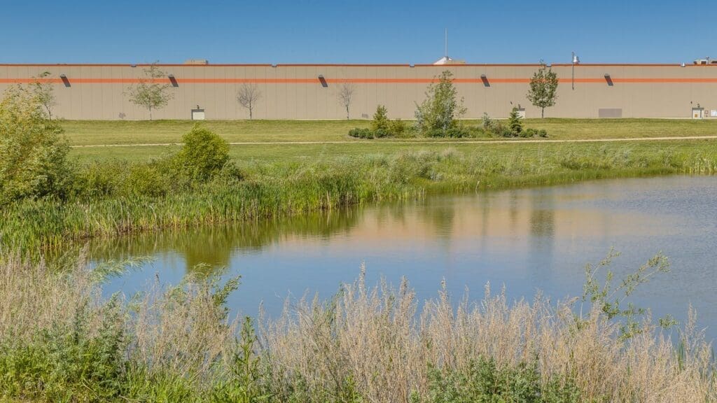 retention pond by a warehouse