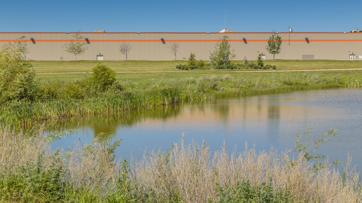 retention pond by a warehouse