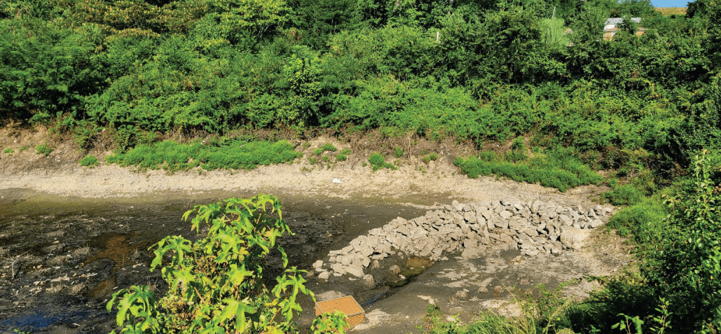 soil erosion of a retention pond