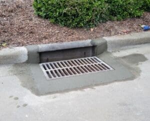 reinstalled sewer grate