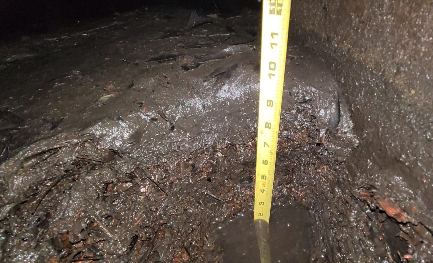 tape measurer in underground detention system