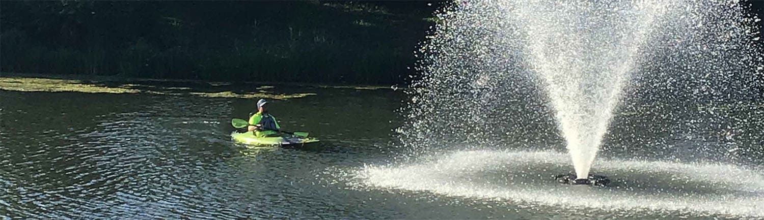 kayaker on a pond