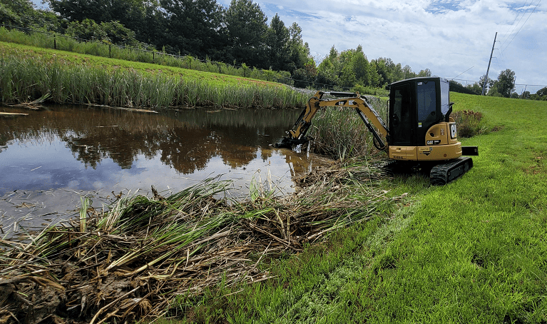 Pond 1 miniexcavator