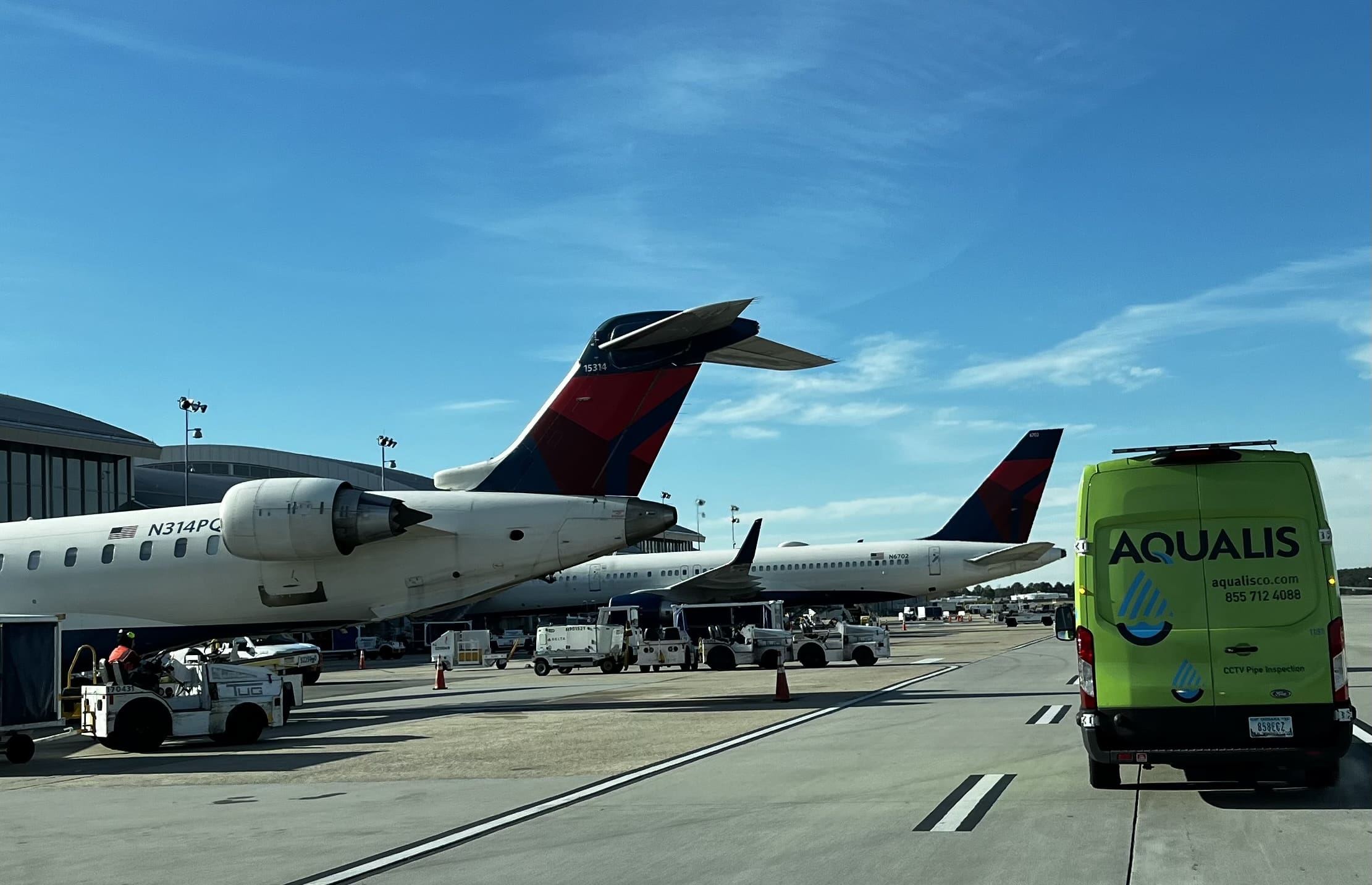 AQUALIS van on an airport runway