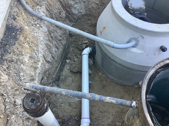 additional pipes connecting lift station and manhole to control center